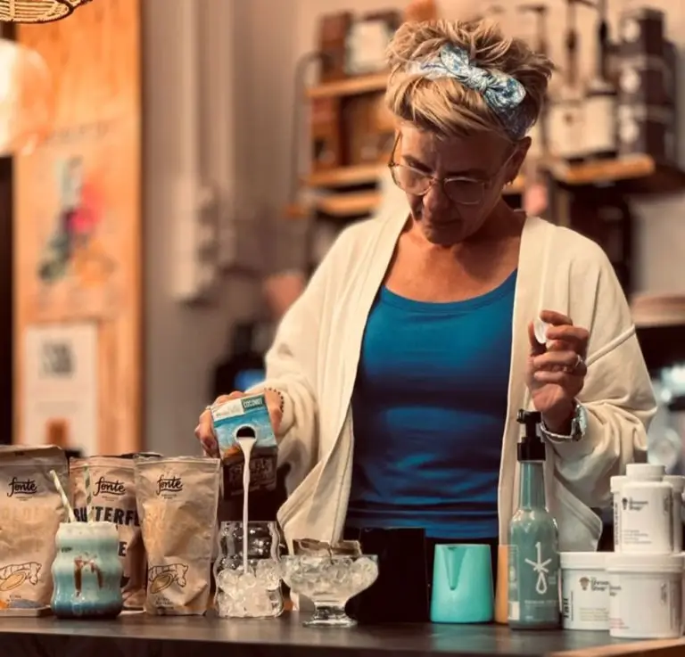 Sara pouring coffee